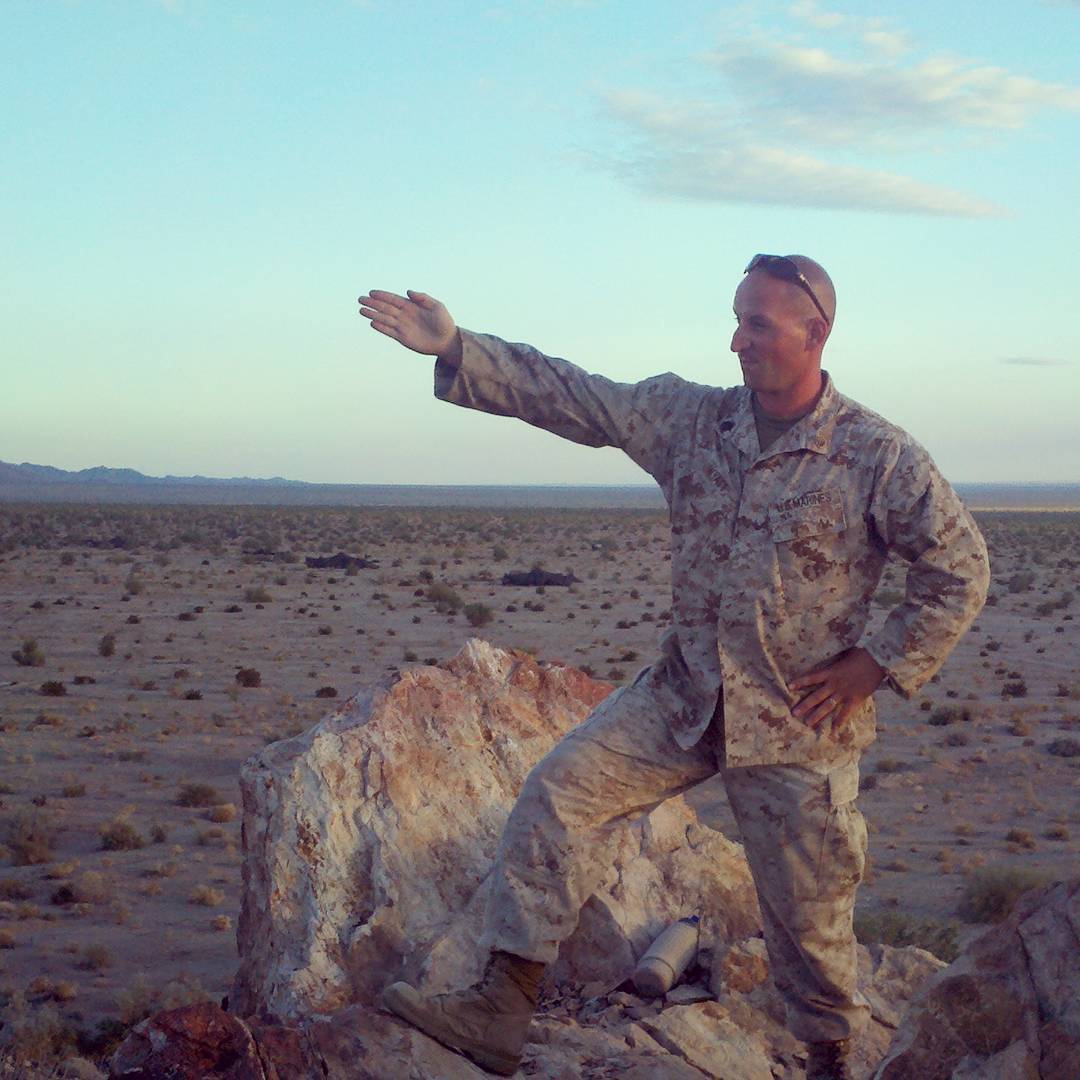 David pointing while serving in Iraq